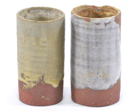HANS COPER (1920-1981); two small cylindrical vessels, incised test numbers for colour and glaze, height 10cm; together with 