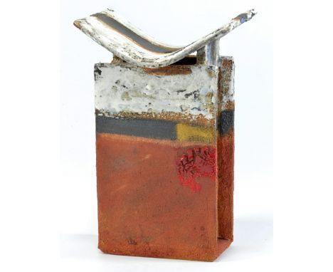 ROBIN WELCH (born 1936); a stoneware vase of rectangular form with curved top, bands of white, black and rust glaze with red 