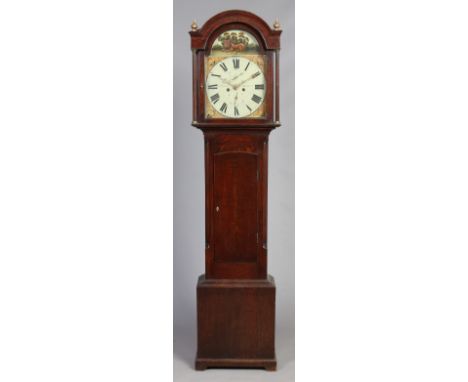 A George III oak eight day longcase clock by James Aitken, Market Harborough. With painted arch top dial and two subsidiarys.