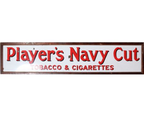 A large vintage enamel advertising sign for Players Navy Cut Tobacco & Cigarettes, 51 cm x 236 cm. Condition Report. To be us