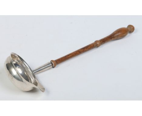 A Georgian silver toddy ladle with turned wooden handle. Engraved with a shield and cipher. Single punch mark indistinct, 31c