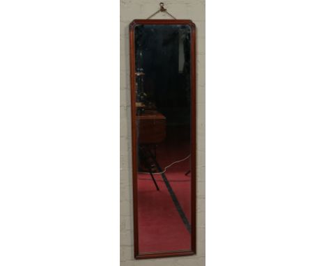 A dressing mirror in reeded mahogany frame. Possibly by Whitlock & Rhead, 125cm.