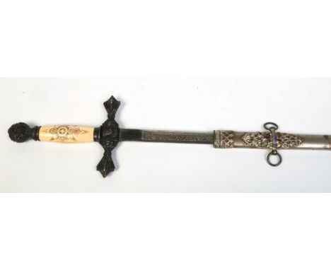 An American Masonic sword in metal scabbard adorned with enamel crosses and with turned ivory grip having penwork decoration.