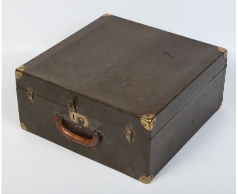 A vintage Louis Vuitton canvas and brass mounted square trunk monogrammed E. D. W. Clasps stamped L. V. Paper label inside nu