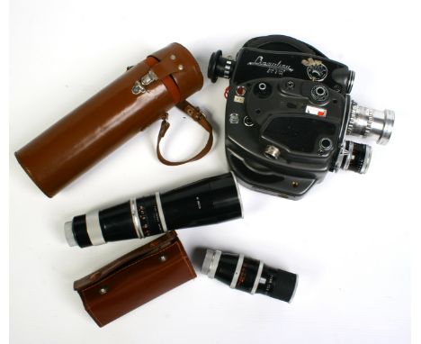 A vintage Beauliou R76 16mm cine camera and four lenses. With two cased lenses; Kern Paillard f = 75mm and f = 150mm. 