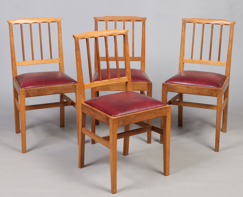 A set of four Alan (Acorn Man) Grainger oak stick back dining chairs ...