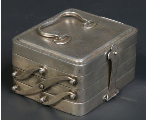 A Continental silver cantilever three tray jewellery box. With swing handle, engine turned engraving and hinged clasps. Stamp