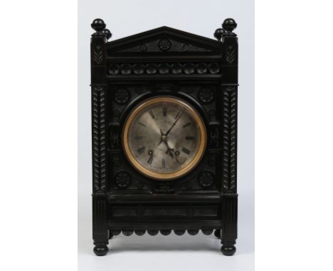 A Victorian carved mahogany large Gothic revival eight day fusee bracket clock. With silvered dial having Roman numeral marke