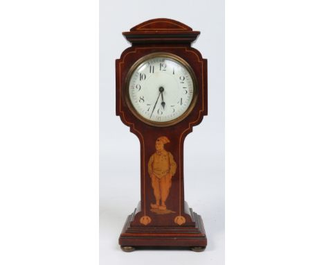An Art Nouveau mahogany cased thirty hour mantel clock. With strung inlay and marquetry decoration depicting a figure, raised