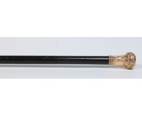 A Victorian ebonized walking cane with chased pinchbeck grip. Stamped Lyon Make, 90cm. Condition Report. To be used as a guid