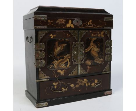 A Japanese early 20th century fitted lacquer work table cabinet, decorated with cranes perched on gnarled branches, 32cm. Con