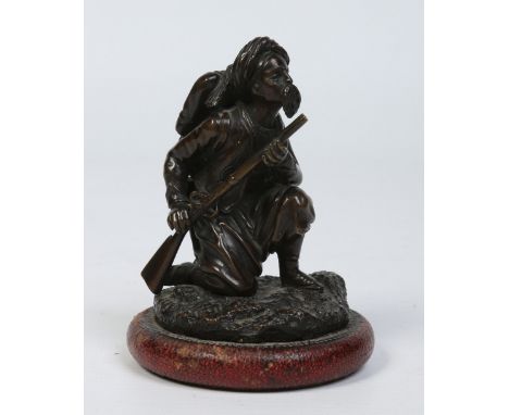 An early 20th century small patinated bronze figure of a Turkish rifleman, 9.5cm.  Condition Report. To be used as a guide on