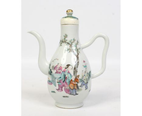 A 19th century Chinese wine ewer. With button knop and loop handle. Painted in polychrome enamels with figures in a garden la