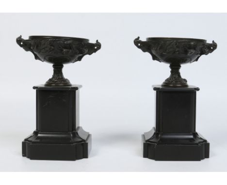 A pair of French Empire slate and patinated bronze mantel garnitures of urn form ornamented with birds and flowers, 20cm.  Co