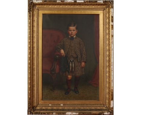 A 19th century gilt framed oil on canvas. Portrait of a young boy leaning against a chair wearing a tartan jacket, waistcoat,