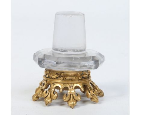 A cut glass decanter stopper with gilt bronze mount formed as a coronet, 6.25cm. Condition Report. To be used as a guide only