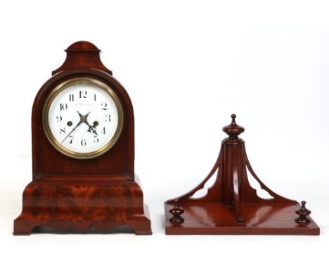 A Biedermeier mahogany cased eight day fusee bracket clock. With enamel dial having Arabic numeral markers signed Le Cems est