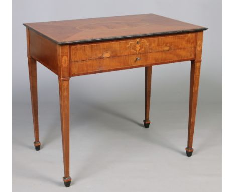 An Irish George III harewood ladies fitted writing table in the manner of William Moore of Dublin. The top hinging to reveal 