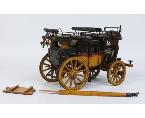 A scratch built detailed scale model stagecoach with black, yellow and red livery. The Commodore, London, Strood, Dartford, R