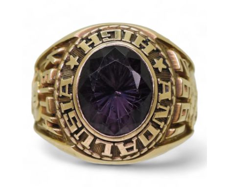 A Jostens brand 10K American college ring, for Andalusia High 1992, set with a purple glass gem, size T1/2, weight 16.1gms Co