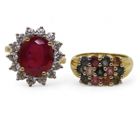 A 9ct gold multi colour sapphire set ring, size N1/2, and a 9ct ruby and white zircon ring, size O1/2, weight combined 10.1gm