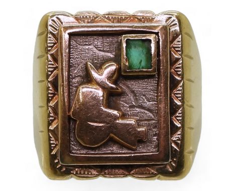 An 18k Mexican style signet ring, set with an (af) emerald, size T1/2, weight 17.1gms Condition Report:Available upon request