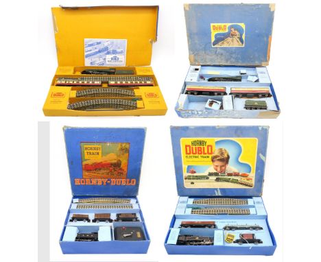 Four various Hornby Dublo 00-gauge train sets, all boxed, to include 4-6-2 Mallard and Silver King locomotives (4) Condition 