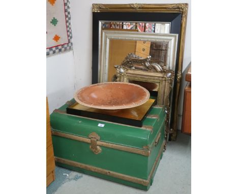 A lot comprising four assorted gilt framed wall mirrors, another black framed bevelled glass wall mirror, ceramic charger, gi