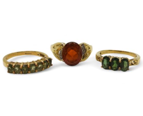 A 9ct gold GemsTV, dark orange citrine and diamond ring, size N1/2, together with a three stone green gem ring size N1/2, and