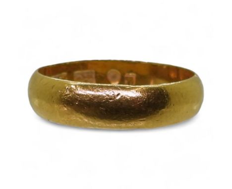 A bright yellow metal wedding ring, stamped with Chinese characters and 96.5%, finger size X1/2, weight 7.6gms Condition Repo