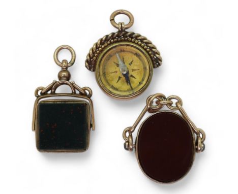 Three 9ct gold carnelian / bloodstone fob seals one with a compass, weigh together 23.7gms&nbsp; Condition Report:Available u