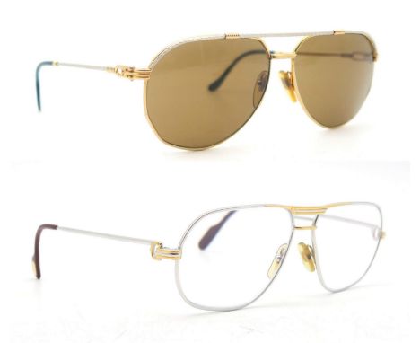 A pair of Cartier glasses, dated 1988, numbered 59 14 to the bridge, the temples marked "Cartier Paris Made in France 140"; t