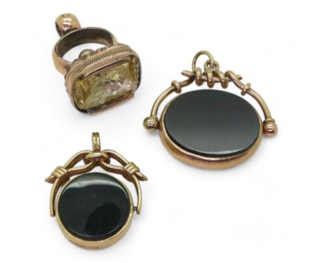 A 9ct bloodstone/carnelian fob with strap design mount, weight 8.8gms, A 9ct gold bloodstone fob, given as a prize in 1897 fr