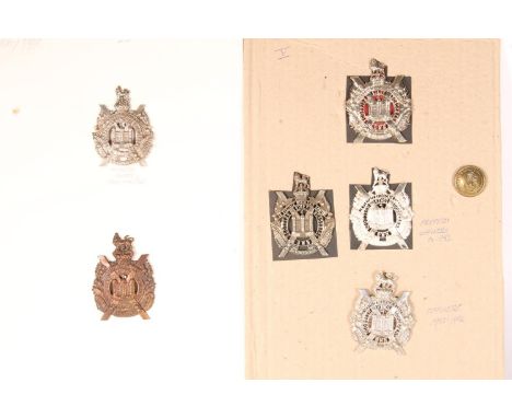 Kings Own Scottish Borderers KOSB insignia to include a fretted cast silver glengarry cap badge with Kings crown, stamped to 