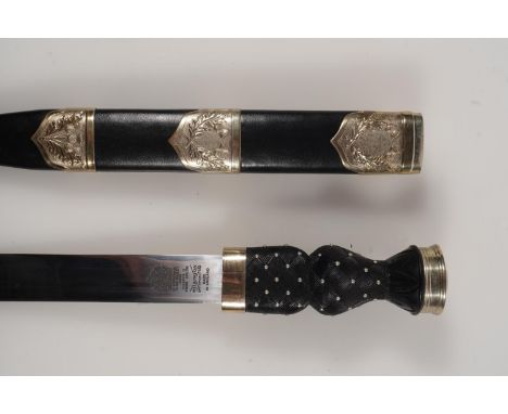 Early 20th century Scottish pipers dirk having white metal mounts, the blade by Wilkinson Sword, stamped to spine '8465-99-13