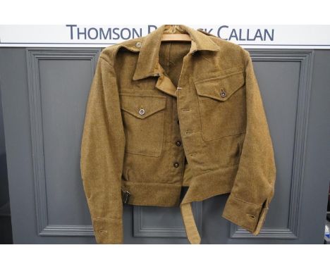 British army uniform, a WWII khaki green battledress blouse jacket, size 3, with OW8 Ltd label dated Sept 1942. 