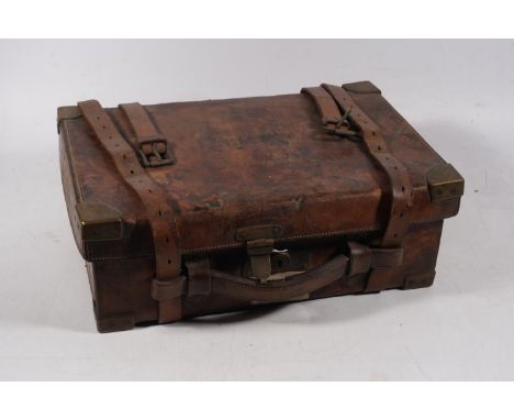 Brown leather clad cartridge case with sectional interior bearing label 'Army &amp; Navy CSL Gun Department 105 Victoria Stre