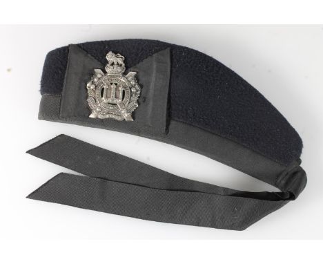Unhallmarked white metal Kings Own Scottish Borderers white metal cap badge on a black cloth glengarry side cap, stamped with