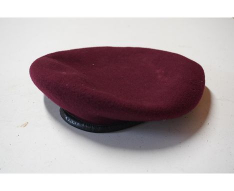 WW2 British Airborne Forces maroon beret having black cloth lining, the interior white stencilled [7 1/4 KANGOL WEAR LIMITED 