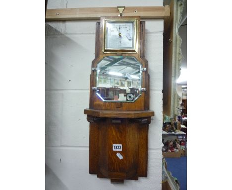 AN OAK CASED WALL BAROMETER, with mirror and an oak cased wall clock (pendulum) (2)