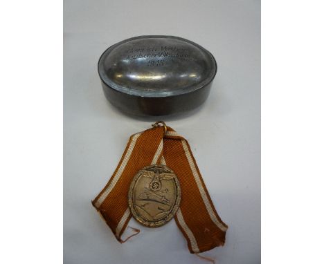 TWO 3RD REICH ITEMS, a pewter snuff box inscribed 'Heinrich Weber Deutscher Volkstum 1945' and a medal