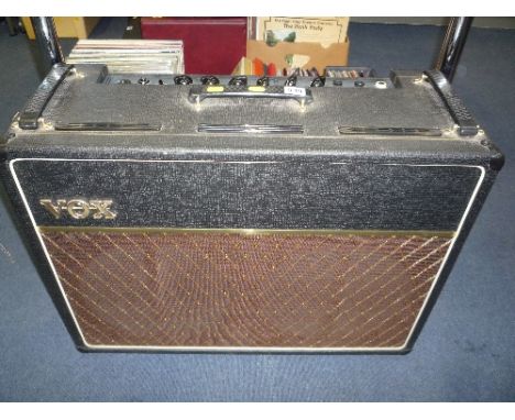 A 1963 VOX AC-30 VALVE  AMPLIFIER, with original valves (bright channel valve needs replacing), Blue Jennings speakers, cover