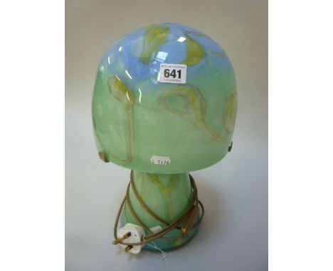 A STUDIO STYLE GLASS TABLE LAMP, shaped as a mushroom, green, blue and yellow design, height approximately 38cm
