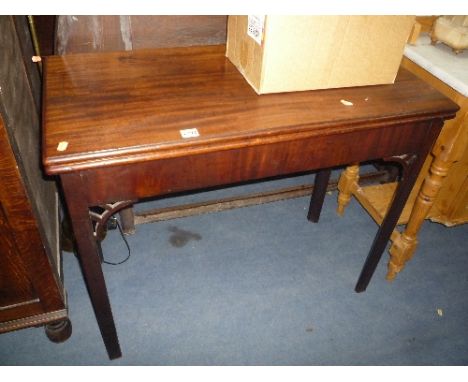 A 19TH CENTURY MAHOGANY FOLD OVER CARD TABLE