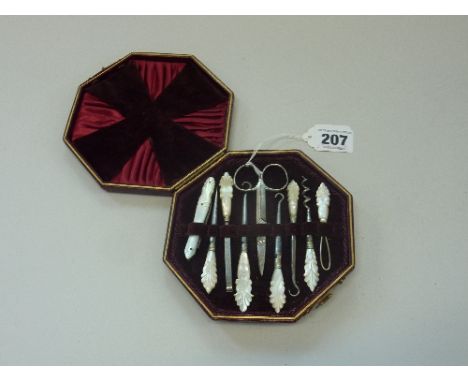 A MOTHER OF PEARL BOXED SEWING KIT