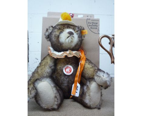 A BOXED STEIFF CLASSIC CLOWN BEAR, brown tipped mohair and yellow pompoms to hat, height approximately 38cm