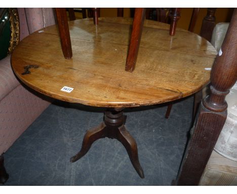 A CIRCULAR OAK TRIPOD TABLE, (s.d.)