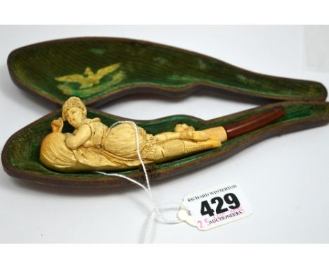 A MEERSCHAUM PIPE, carved as a scantily clad lady, in original fitted case