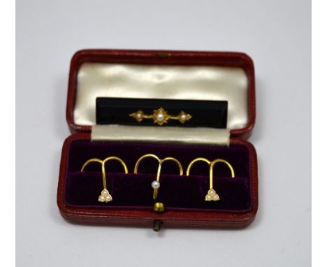 TWO ITEMS, the first a jet and pearl mourning brooch with gold detail, together with three boxed pearl heart shape slides