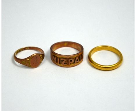 THREE RINGS, the first a plain band, stamped 22ct, together with a 9ct rose gold signet ring and a MIZPAH ring, hallmarks for